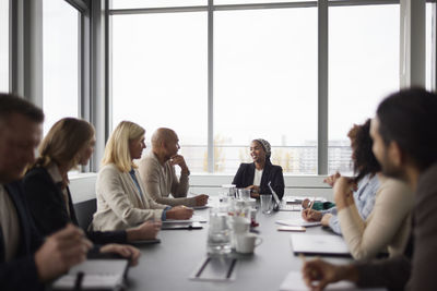 People talking during business meeting