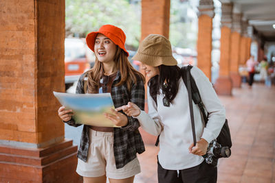 Young woman using mobile phone