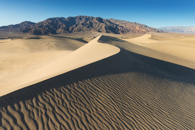 Scenic view of desert against sky