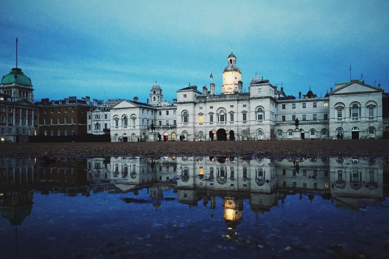 architecture, building exterior, built structure, water, reflection, sky, waterfront, city, building, cloud - sky, travel destinations, dome, residential building, outdoors, history, facade, residential structure, window, river, dusk