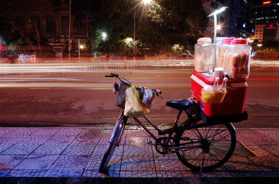 Horse cart on street at night