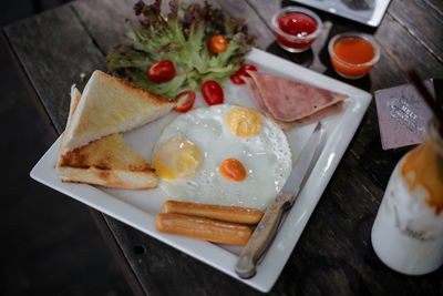 High angle view of breakfast served on table