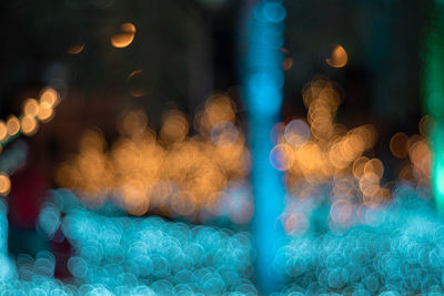 Defocused image of illuminated lights at night