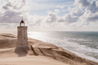 Rubjerg knude lighthouse in desert at seashore
