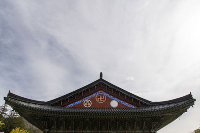 Low angle view of temple building against sky