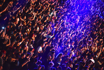 High angle view of crowd cheering at stadium