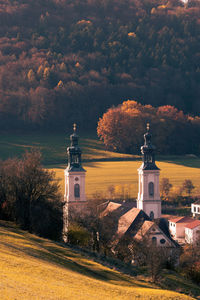 High angle view of church against trees