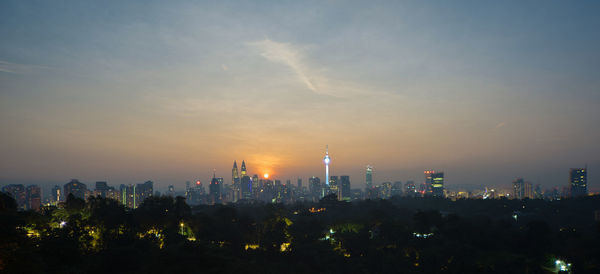 View of cityscape against sky during sunset