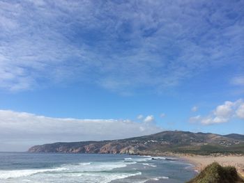Scenic view of beach against sky