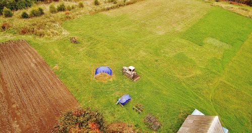 High angle view of people walking on field