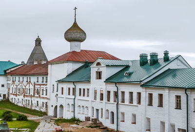 View of old building in city against sky