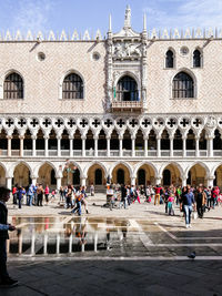 Group of people in front of building