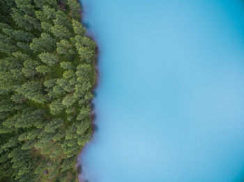 Scenic view of mountains against blue sky