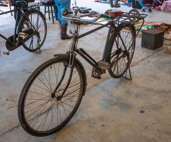 High angle view of bicycle parked on footpath