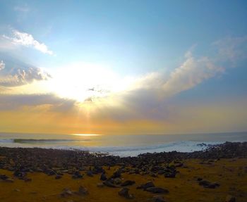 Scenic view of sea at sunset