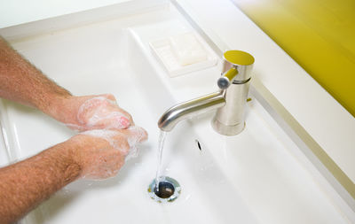 High angle view of faucet in bathroom