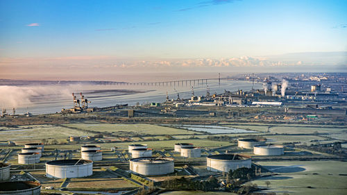 High angle view of factory at sunset