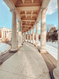 Corridor of historic building against sky