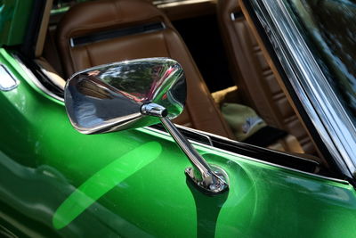 Cropped image of green car