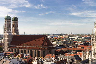 High angle view of buildings in city against sky