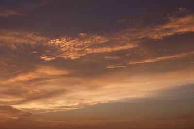 Low angle view of clouds in sky during sunset