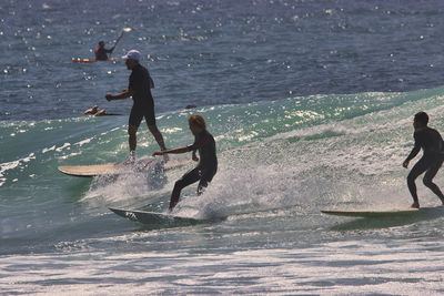 People enjoying in sea