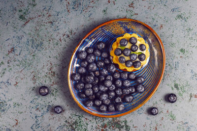 High angle view of fruits in bowl on table