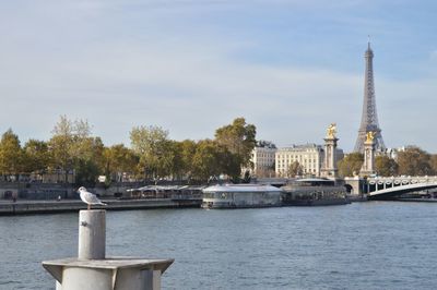 River in city against sky