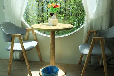 Empty chairs and table at home