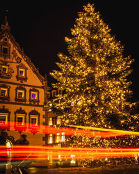 Illuminated christmas tree at night