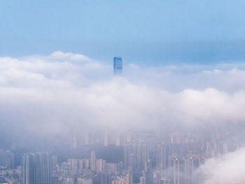 Cityscape amidst clouds