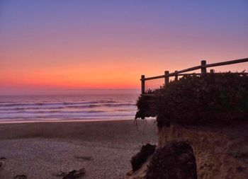 Scenic view of sea at sunset