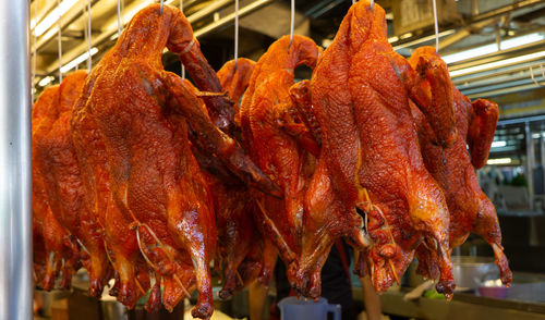 Chicken meat hanging for sale