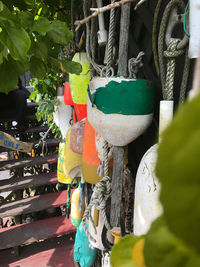 Close-up of multi colored hanging on clothesline