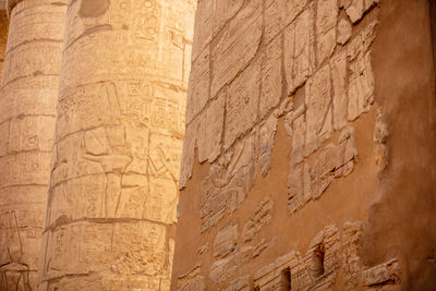 Different hieroglyphs on the walls and columns in the karnak temple.