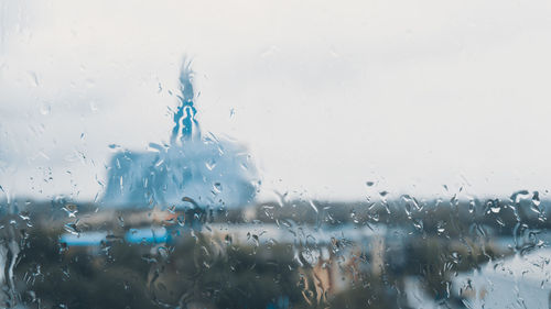 Full frame shot of raindrops on glass window