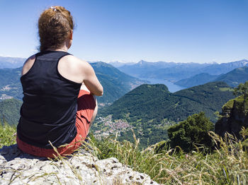 Woman admiring the landscape of lake como