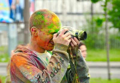 Woman photographing through camera