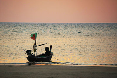 Scenic view of sea against clear sky during sunset