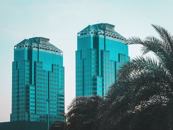 Low angle view of modern buildings against sky