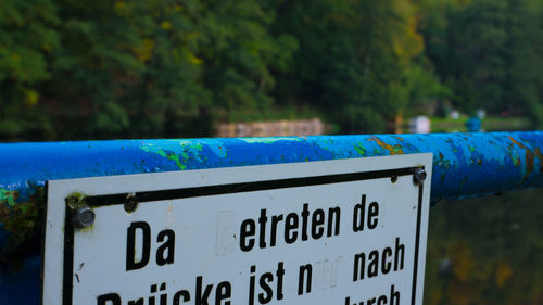 Close-up of information sign
