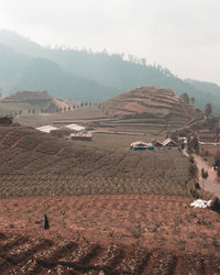 Scenic view of village against sky