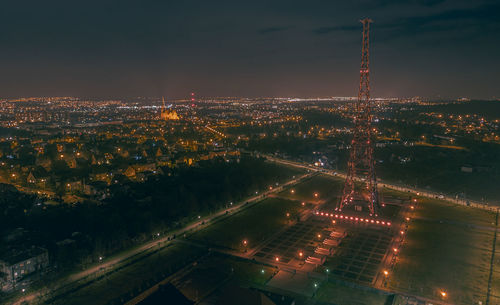 High angle view of illuminated city buildings at night