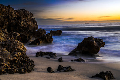 Scenic view of sea against sky during sunset