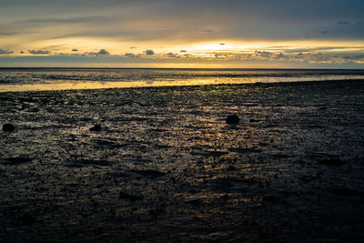 Scenic view of sea against sky during sunset