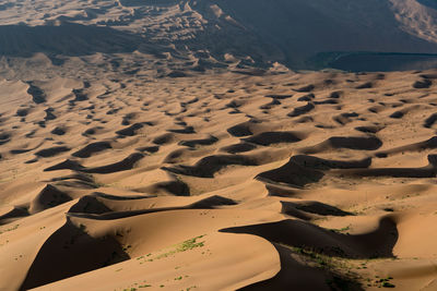 High angle view of sand dunes at beach