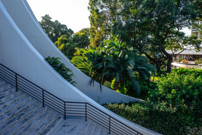 Staircase by building against sky