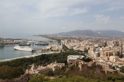 Aerial view of cityscape against sky