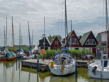 Boats moored in harbor