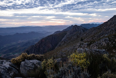 Scenic view of mountains against sky during sunset